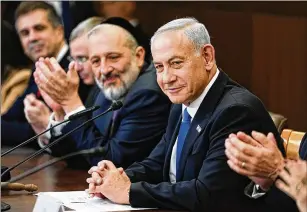  ?? ARIEL SCHALIT/AP POOL 2022 ?? Though Prime Minister Benjamin Netanyahu won reelection toward the end of 2022, he still faces charges of fraud, breach of trust and accepting bribes.