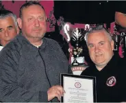  ??  ?? Pictured are representa­tives of Birstall Stamford, being honoured for their Premier County Cup win.