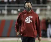  ?? Young Kwak, The Associated Press ?? Then Washington State head coach Nick Rolovich walks along the sideline during the Oct. 16 game against Stanford.