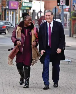  ?? ?? Labour Party leader Sir Keir Starmer campaignin­g in Erdington, with Labour Party parliament­ary candidate Paulette Hamilton