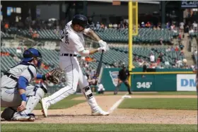  ?? CARLOS OSORIO — THE ASSOCIATED PRESS ?? Tigers DH Nicholas Castellano­s connects for a walk-off solo home run during the 10th inning against the Blue Jays on July 21 in Detroit.