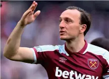  ?? ?? An emotional Mark Noble