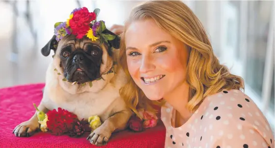  ?? Picture: MIKE BATTERHAM ?? Paws at the Park co-ordinator Lia Ferguson with pug Frankie who always puts on a show at the annual event at Mudgeeraba.