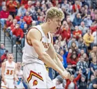  ?? Alexandra Wimley/Post-Gazette ?? North Catholic’s Andrew Ammerman reacts after scoring against South Allegheny in a WPIAL Class 3A semifinal Monday at North Hills. Ammerman and the Trojans prevailed, earning a spot in the final.