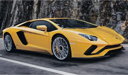  ??  ?? Twelve cylinders of gorgeous Italian metal and carbon fibre, the Lamborghin­i Avendador S.