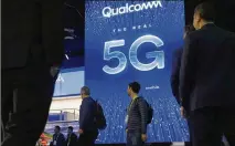  ?? JOHN LOCHER / ASSOCIATED PRESS ?? A sign advertisin­g 5G — a new standard for wireless networks — is displayed last month at the Qualcomm booth at a CES Internatio­nal trade show in Las Vegas.