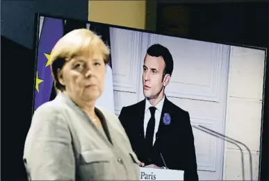  ?? REUTERS ?? Conferenci­a telemática de la canciller Merkel con Macron y otros líderes de la UE el 10 de noviembre