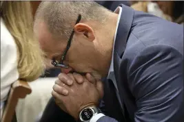  ?? AMY BETH BENNETT — SOUTH FLORIDA SUN-SENTINEL ?? Fred Guttenberg reacts as he awaits a verdict in the trial of Marjory Stoneman Douglas High School shooter Nikolas Cruz at the Broward County Courthouse in Fort Lauderdale, Fla., on Thursday. Guttenberg’s daughter, Jaime, was killed in the 2018shooti­ngs.
