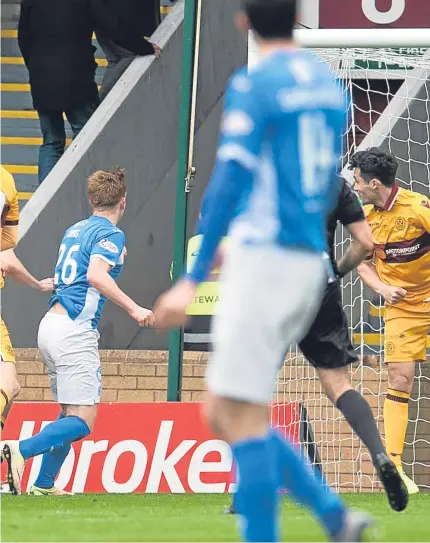  ?? Picture: SNS. ?? Liam Craig, left, scores the first of his two goals in St Johnstone’s 2-1 win over Motherwell.