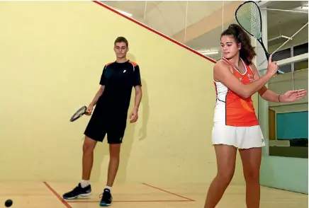  ?? KAVINDA HERATH/STUFF ?? Bay of Plenty brother and sister, Glenn and Katie Templeton, practice for the New Zealand Junior Squash Open in Invercargi­ll.