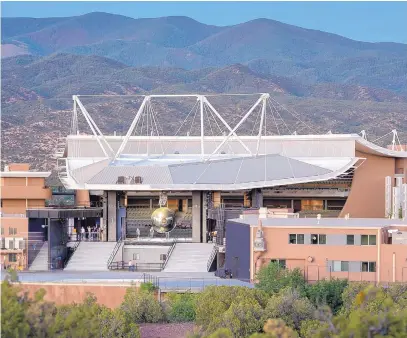  ?? EDDIE MOORE/JOURNAL ?? The 2-ton stainless steel ball in the center of the stage will be the “Gadget” for the opera “Dr. Atomic” that opens mid-July at the Santa Fe Opera.