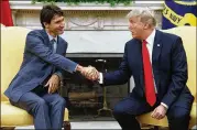  ?? EVAN VUCCI / ASSOCIATED PRESS 2017 ?? President Donald Trump shakes hands with Canadian Prime Minister Justin Trudeau in the Oval Office last year, but their relationsh­ip has grown frosty over trade disagreeme­nts.