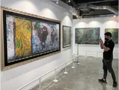  ?? ?? Visitors can view 28 selected artworks from Khazanah’s collection at slate at the row in Kuala Lumpur until sept 4.