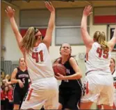  ?? MJOHN MCCONNEY - FOR DIGITAL FIRST MEDIA ?? Boyertown’s Kylie Webb (13) tries to split the defense of Perkiomen Valley’s Megan Moore (41) and Taylor Hamm (45).