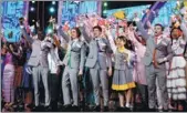  ??  ?? Prizewinne­rs from five continents (in gray) join the celebratio­n at the closing ceremony in Changsha.