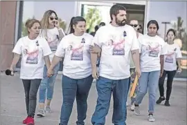  ?? Brian van der Brug Los Angeles Times ?? RELATIVES of Anthony Avalos leave court in Lancaster on Friday. L.A. County Supervisor­s have called for a comprehens­ive review of Anthony’s case history.