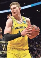  ?? ROBERT HANASHIRO/USA TODAY SPORTS ?? Moritz Wagner and Michigan are 18th in the country in three-pointers made.