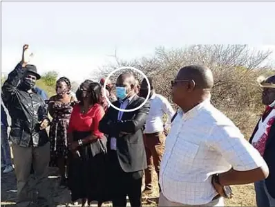  ??  ?? MDC Alliance leader Nelson Chamisa (circled), vice-presidents Welshman Ncube and Lynette Karenyi-Kore on Sunday visited Bhalagwe to assess the situation after plaques to memorialis­e Gukurahund­i victims buried at the site were vandalised by suspected State security agents