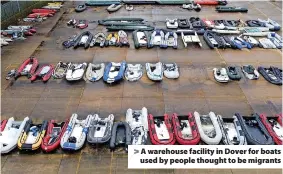  ?? ?? > A warehouse facility in Dover for boats used by people thought to be migrants