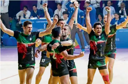  ?? PTI ?? The Iranian kabaddi team is ecstatic after winning against India during their semifinal match of the Asian Games on Thursday. —