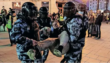  ?? | EPA ?? RUSSIAN police detain a demonstrat­or in an unauthoris­ed protest against the partial mobilisati­on due to the conflict in Ukraine, in central Moscow, yesterday.