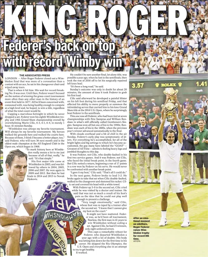 ?? AP/EPA ?? After an emotional moment on sidelines, Roger Federer raises Wimbledon trophy for record 8th time.