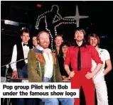  ??  ?? Pop group Pilot with Bob under the famous show logo