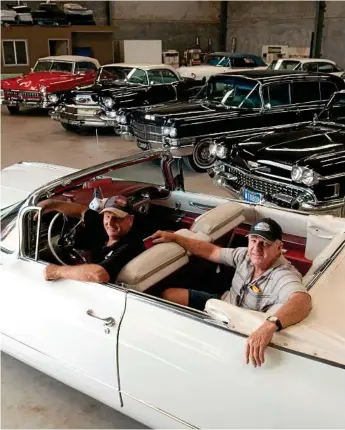  ?? Photo: Nev Madsen ?? FOND MEMORIES: Les Holt (left) and good mate of 35 years Des Eyers pictured in one of Mr Holt’s prized Cadillacs. Mr Holt and Mr Eyers shared a love of cars, in particular Cadillacs.