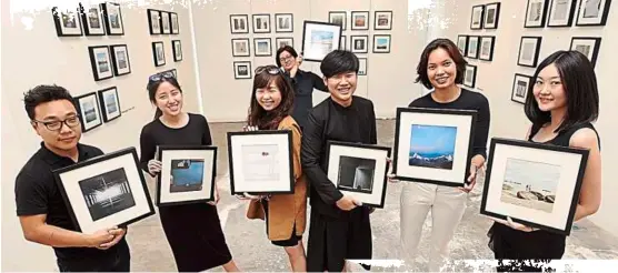  ??  ?? For a good cause: The mobile photograph­ers who had their work showcased at the #ChasingSqu­ares exhibit at d6, Sentul east, Kuala Lumpur. (From left) Sean Jesudasan, Trisha Toh, Koyuki Inagaki, yin Tan, Joey Mah, Mai Fernandez and Lydia Tan.