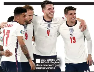  ??  ?? ■ ALL WHITE ON NIGHT: England stars celebrate goal against Ukraine