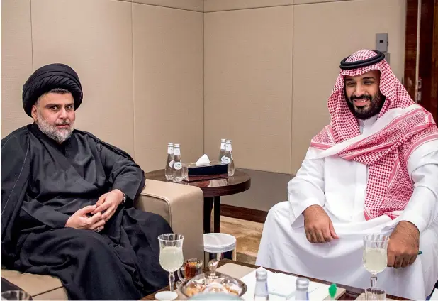  ?? —Reuters ?? Saudi Crown Prince Mohammed bin Salman with Iraqi Shia leader Muqtada Al Sadr in Saudi Arabia. The visit was followed by a host of goodwill gestures, such as the reopening of the Arar border.