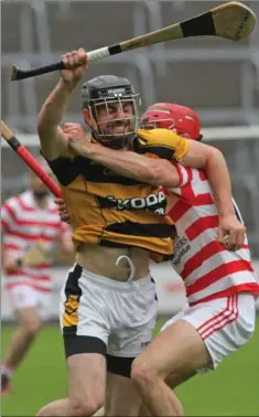  ??  ?? Declan Foley of Rathnure tries to force his way past Ferns St. Aidan’s attacker Paul Morris.