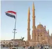  ?? — AFP ?? An Egyptian flag flies outside the Grand Mosque of Al-sahaba (Companions of the Prophet) in Sharm el-sheikh.