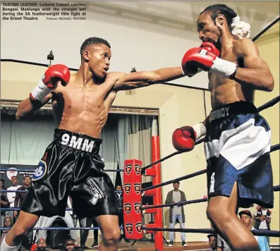  ?? Picture: MICHAEL PINYANA ?? TASTING LEATHER: Ludumo Lamati catches Bongani Mahlangu with the straight left during the SA featherwei­ght title fight at the Orient Theatre