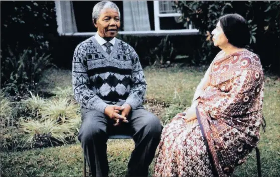  ??  ?? MUCH TO CATCH UP WITH: Fatima Meer with Nelson Mandela in 1990 after his release, at the Meer residence, 148 Burnwood Road in Sydenham, Durban.