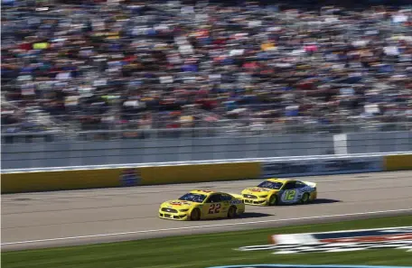  ?? AP ?? ZOOM ZOOM: Joey Logano (22) and Ryan Blaney drive during the NASCAR Cup Series race at the Las Vegas Motor Speedway on Sunday.