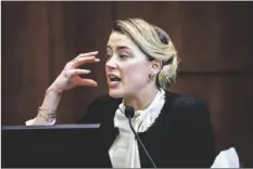 ?? JIM LO SCALZO/AP ?? Actress Amber Heard testifies in the courtroom at the Fairfax County Circuit Court in Fairfax, Va., on Thursday.