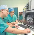  ??  ?? Edinburgh University doctors test LiverMulti­Scan.