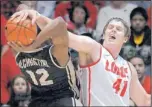  ?? PAT VASQUEZ-CUNNINGHAM/JOURNAL ?? The Lobos’ Cameron Bairstow (41) blocks a shot by Idaho’s Mike McChristia­n (12) during their game in the Pit last month.