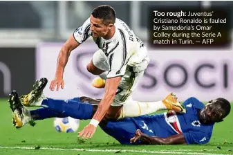  ??  ?? Too rough: Juventus’ Cristiano Ronaldo is fauled by Sampdoria’s Omar Colley during the Serie A match in Turin. — AFP