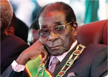  ?? ?? WHY SO GLUM? Even in death, Mugabe remains a divisive figure