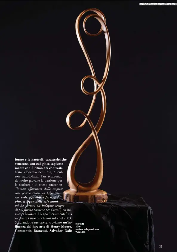  ??  ?? L’infinito
2016 scultura in legno di noce 95x25 cm.