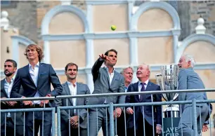  ?? AP ?? Spain’s Rafael Nadal throws a ball to fans during a welcome ceremony of the Laver Cup at the Old Town square in Prague, Czech Republic, on Wednesday. The competitio­n will pit a team of the best six European players against the top six from the rest of...