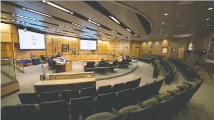  ?? BRANDON HARDER ?? Regina’s city council met to declare a local state of emergency Friday in a nearly empty council chambers.