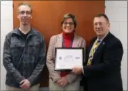  ?? SUBMITTED PHOTO ?? Susan Mateka, center, receives the Department of Defense Patriot Award from retired Pennsylvan­ia National Guard Col. Patrick Heron,right. Mateka was nominated by CCDC behavior mentor Nate Ashbaugh, left.