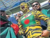  ?? GETTY ?? Shoaib Ali’s journey as Bangladesh super fan in all tiger stripes started the day Sachin Tendulkar scored his 100th century.