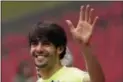  ?? NG HAN GUAN — THE ASSOCIATED PRESS ?? In this 2014 photo, Brazil’s Kaka waves as he arrives for a training session ahead of a friendly match against Argentina at the Bird’s Nest National Stadium in Beijing, China.