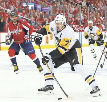  ?? GEOFF BURKE, USA TODAY SPORTS ?? The Penguins’ Evgeni Malkin, right, has an NHL-high 15 points (four goals, 11 assists) in this year’s playoffs.