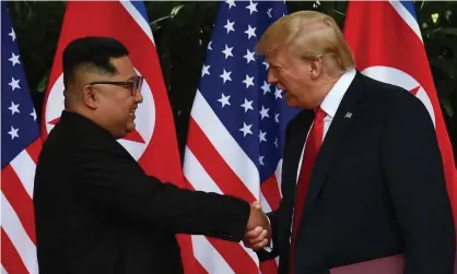  ?? Photograph: Anthony Wallace/AFP/Getty Images ?? Kim Jong-un and Donald Trump meeting in Singapore.