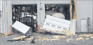  ?? JOE GIBBONS/THE TELEGRAM ?? A section of damage caused by the Tuesday morning explosion at Trimac National Tank Services in the Donovans Business Park.